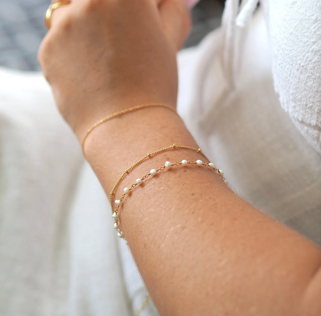 Pearl bracelet discount gold designs